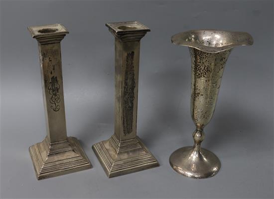 A pair of Gorham sterling silver candlesticks of Doric form and a Shreve & Co specimen vase,